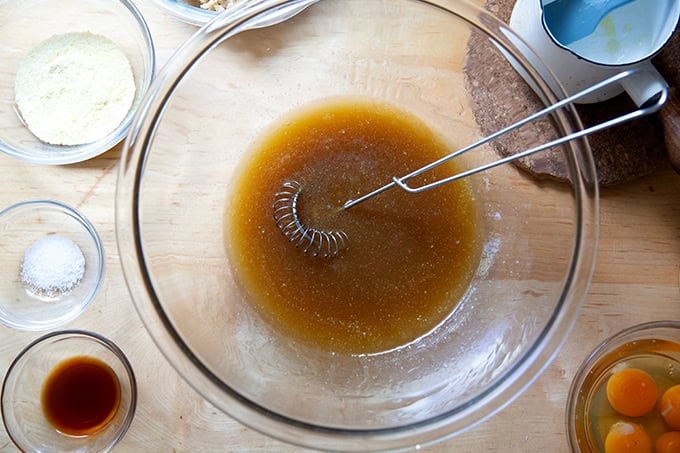 A bowl with maple syrup and melted butter whisked together.