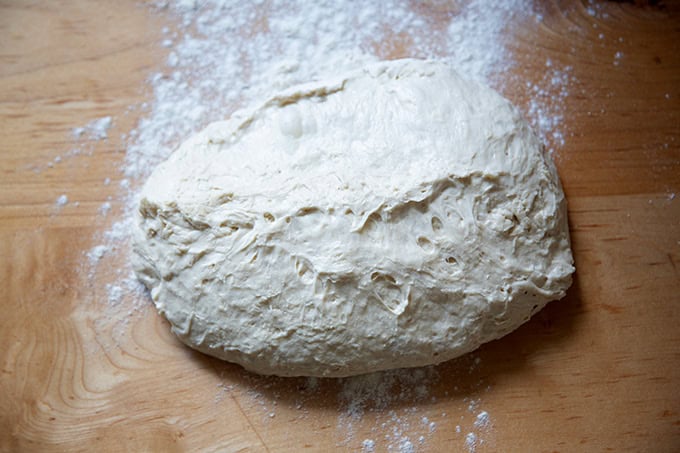 Jim Lahey's no-knead bread dough after a long 18-hour rise, turned out onto a floured work surface.