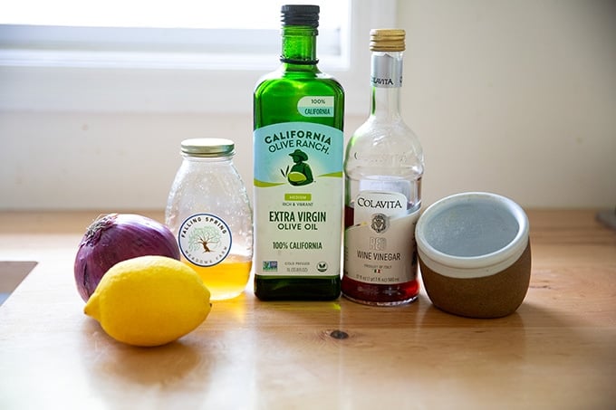 Ingredients to make red wine vinaigrette.