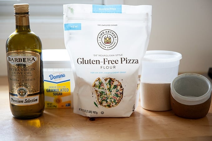 Ingredients to make gluten-free pizza crust on a countertop.