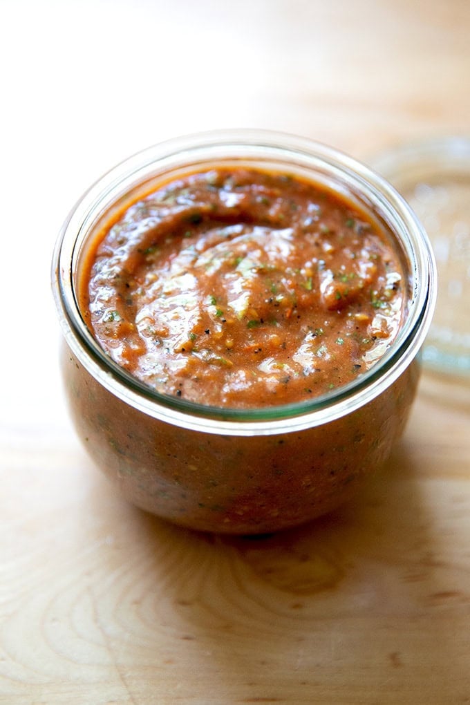 A jar of blistered tomato salsa.