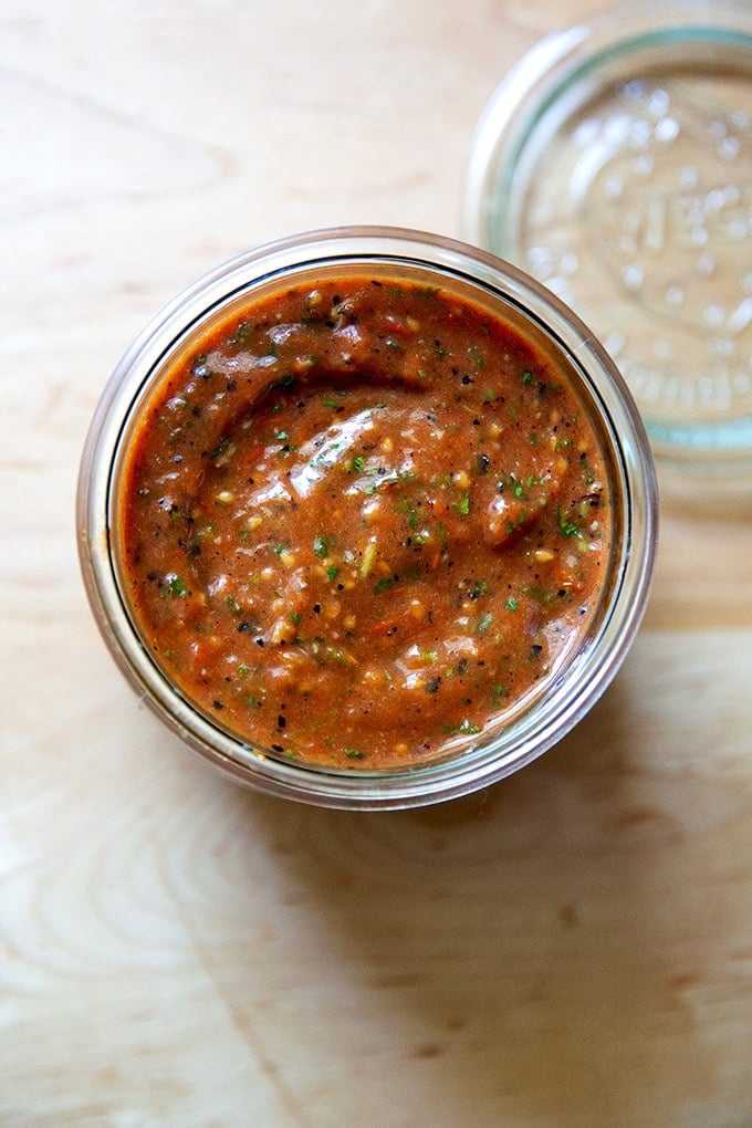 A jar of blistered tomato salsa.