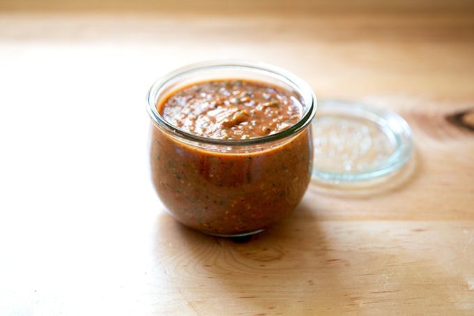 A jar of blistered tomato salsa.