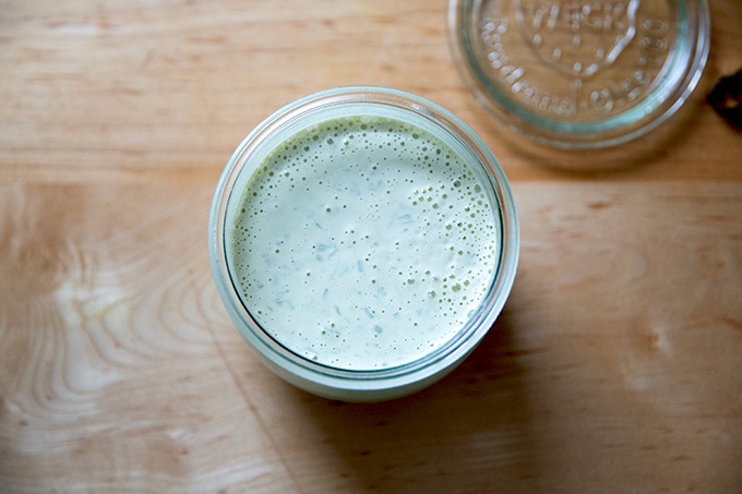 A jar of vegan ranch dressing.