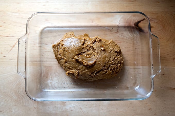 Gingerbread cookie bars dough in 9x13-inch pan.