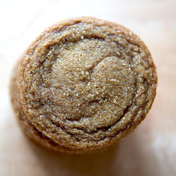 An overhead view of a stack of gingersnap cookies.