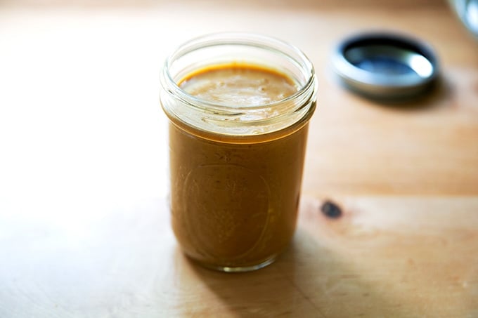 Peanut dressing in a jar.