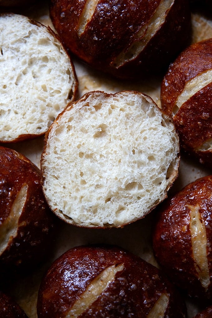 A halved pretzel roll.