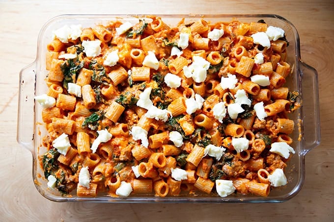 A 9x13-inch pan filled with an unbaked baked pasta ready for the oven.