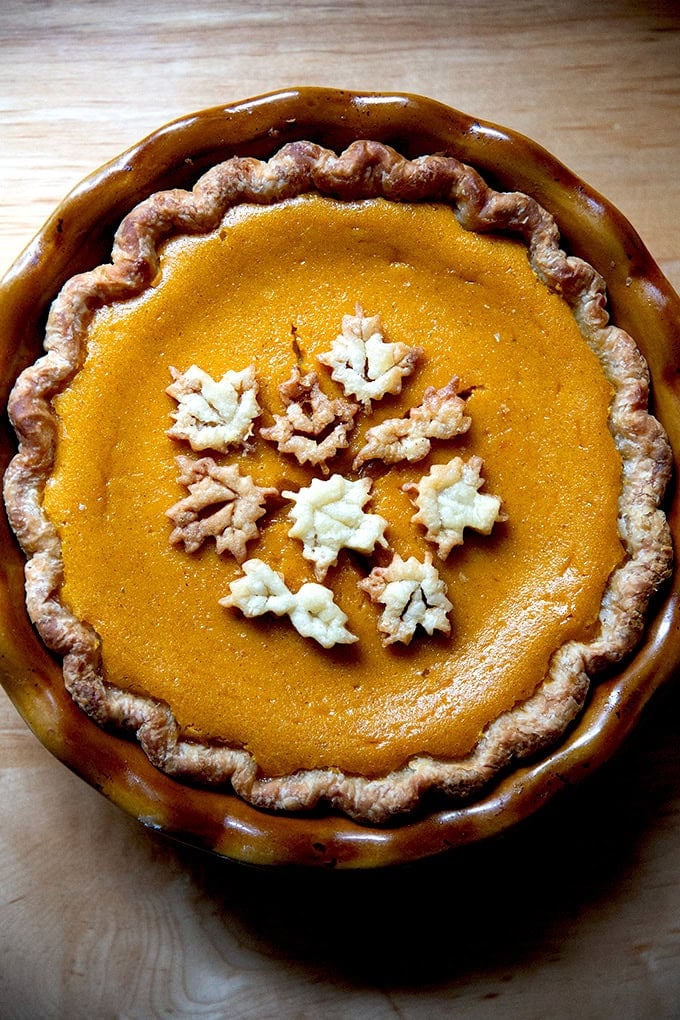 A butternut squash pie decorated with pie dough cookies.