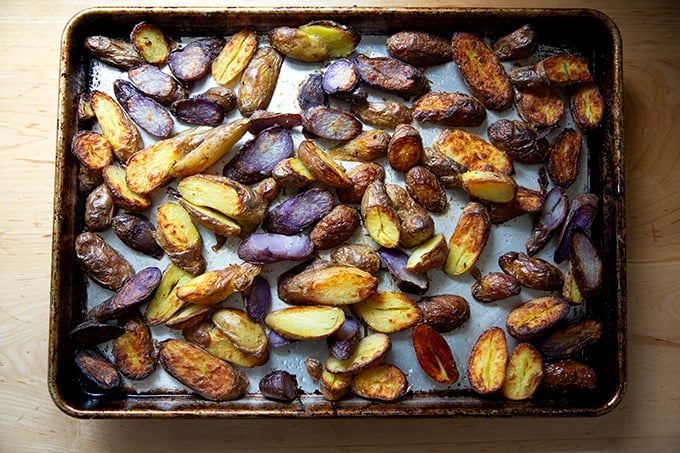 Roasted Fingerling potatoes on a sheet pan.
