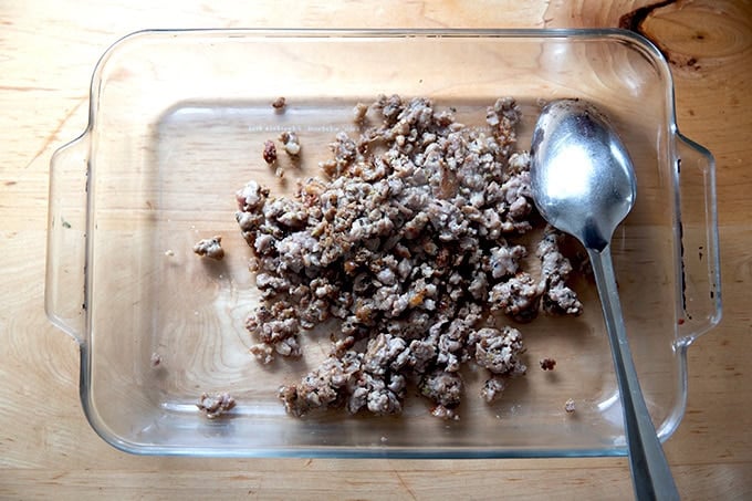 A 9x13-inch pan filled with browned sausage.