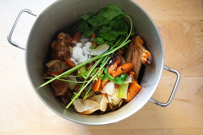 The ingredients to make turkey stock in a large pot.