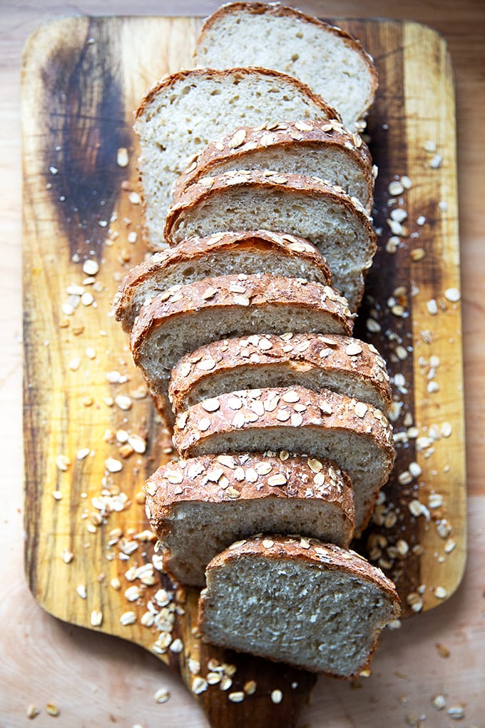 A board of sliced oatmeal maple bread.