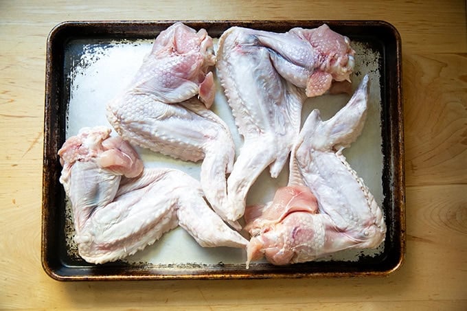 Turkey wings on a sheet pan.