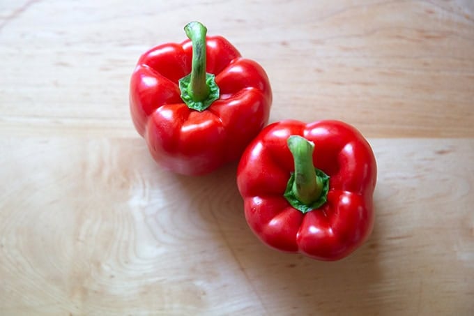 Two red bell peppers.