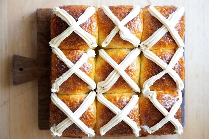 A board of hot cross buns.