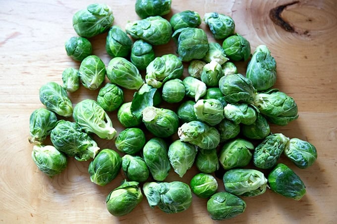Two pounds of Brussels sprouts on a countertop.