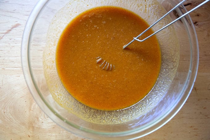 Pumpkin muffin batter after the spices, sugar, salt, and leavening have been added.