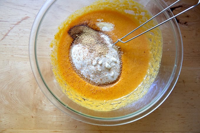 The spices, sugar, salt, and leavening added a bowl of pumpkin muffin batter.